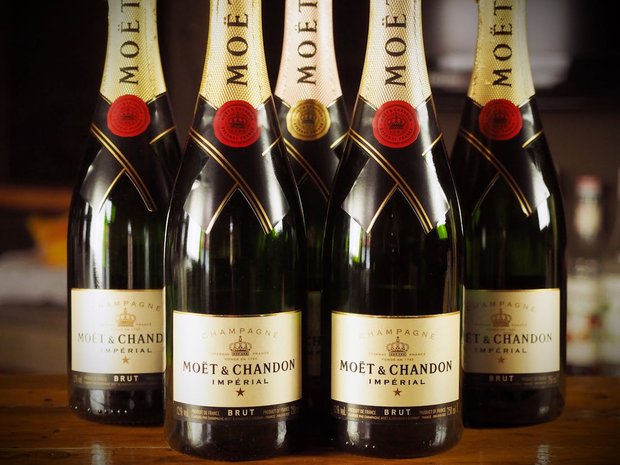 Close-up of Moët & Chandon Brut Imperial champagne bottles, showcasing luxury and elegance.